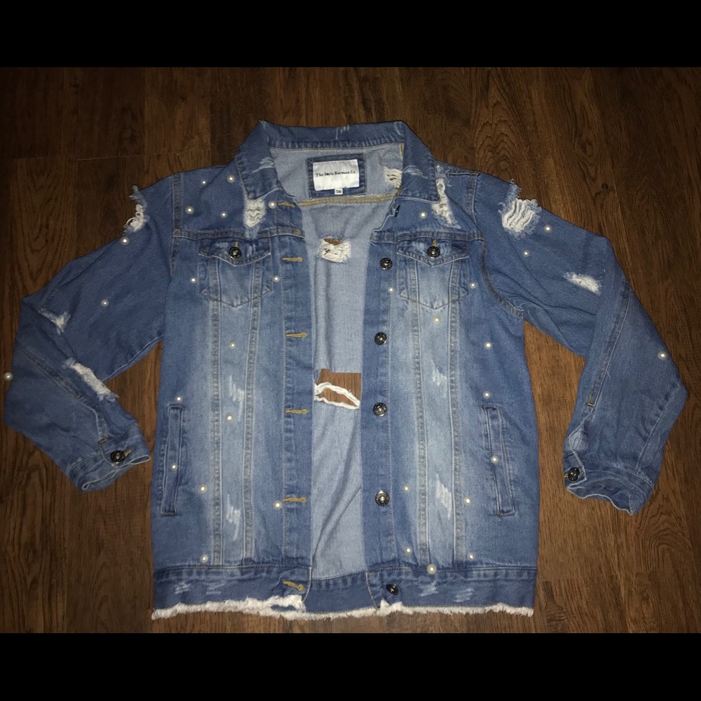 Distressed jean jacket